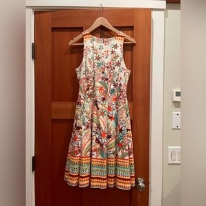 Only wore it once to a wedding. Love it but just never wear it! Fabulous colors.